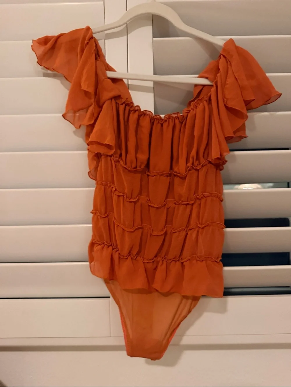 Free People Orange Ruffled Bodysuit XS Womens - never been worn